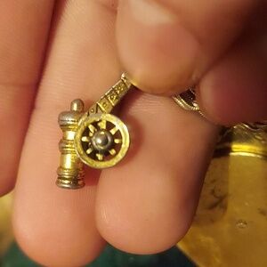Vintage cannon charm by kinney. Missing a wheel. Lost in battle.